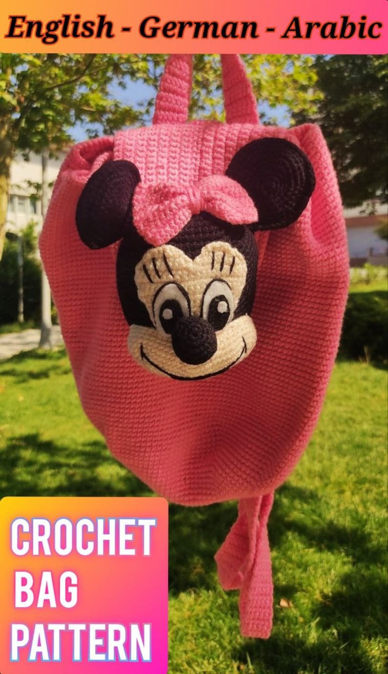 May include: A pink crocheted backpack with a Minnie Mouse face on the front. The backpack has a black bow and black ears. The text "CROCHET BAG PATTERN" is on a colorful background in the bottom left corner of the image.