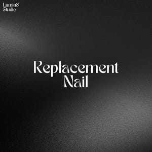 May include: Black and white text on a black background that reads "Replacement Nail".