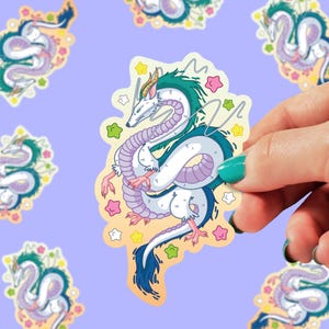 May include: A sticker featuring a cartoon white dragon with blue and green accents. The dragon is curled up with its tail in its mouth. The sticker has a pastel background with stars and hearts.