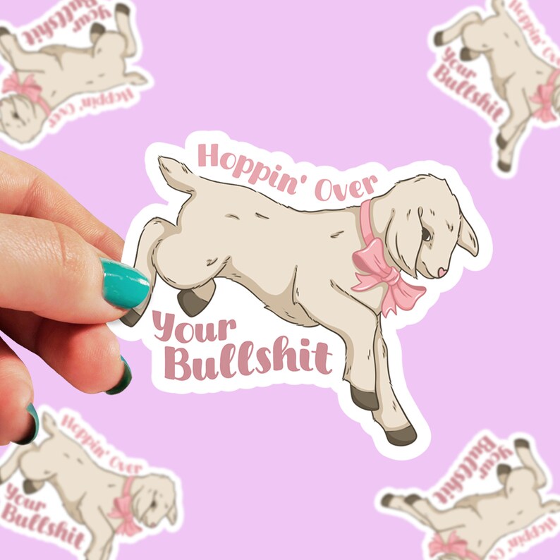 May include: A white lamb with a pink bow jumps over the text "Hoppin' Over Your Bullshit".