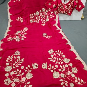 Bright pink crepe georgette saree with pashmina border work  with stitched blouse
