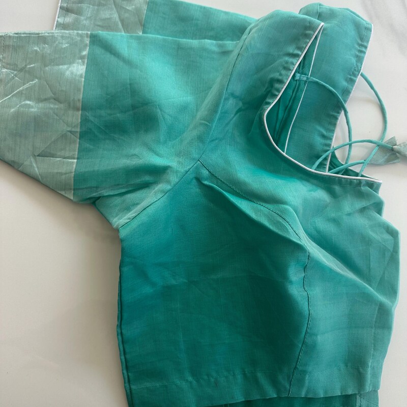 Turquoise Blue Multi Color Resham Embroidered Tulle Saree