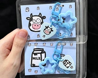 Juego de llaveros con púa de guitarra de vaca y leche, con clip azul claro, dije de estrella y tarjeta con mensaje, para guitarrista, regalo de San Valentín.