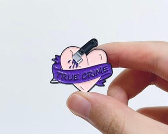 True Crime Heart Enamel Pin — Knife in Heart with Purple Banner | For Jackets, Ita Bags, Backpacks, Pin Boards, Podcast Nights, Festivals