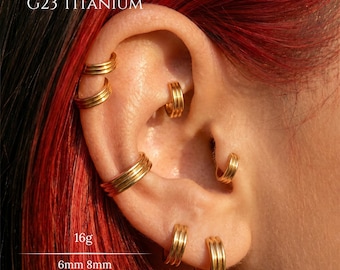 Anillo de aro articulado de titanio de grado implante G23 de tres líneas, oro 16G, ideal para la nariz, el septum, el cartílago, el hélix, el tragus, el daith, el conch y el lóbulo.