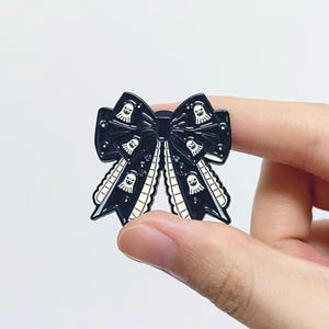 Ghost Bow Enamel Pin — Black & Ivory Ribbon with Tiny Ghost Motif | For Jackets, Ita Bags, Backpacks, Pin Boards, Halloween, Collectors