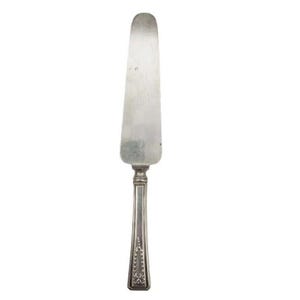May include: A silver cake server with an ornate handle. The blade is smooth and the handle has a floral design.