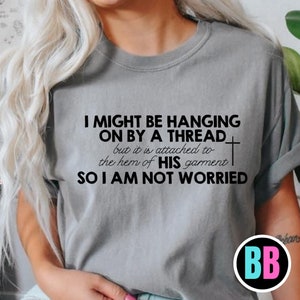 I might be hanging by a thread tshirt