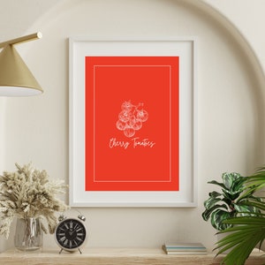 May include: A white line drawing of a bunch of cherry tomatoes on a bright red background. The text "Cherry Tomatoes" is written below the drawing.