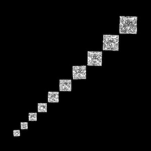 May include: A row of nine clear, square-shaped diamonds arranged in ascending size from left to right against a black background.