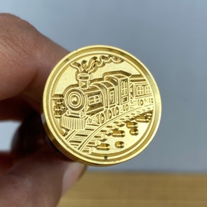 Sello de cera con mango para locomotora de vapor de tren y vía