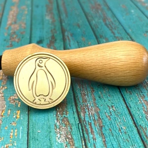 Sello de cera de pingüino con mango