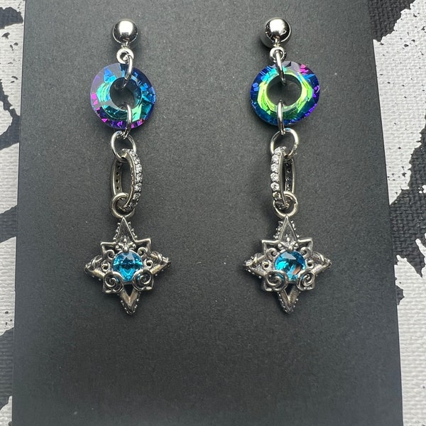 Brilliant blue cosmic glass sterling star dangle earrings