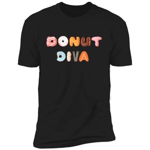 May include: Black t-shirt with the text "Donut Diva" in colorful donut-shaped letters.