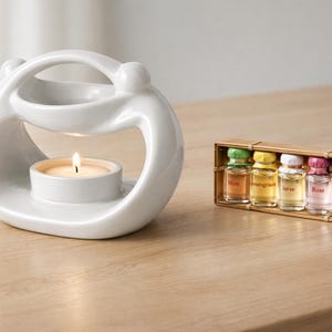 Diffuseur pour huiles essentielles en Céramique  "Couple enlacé"