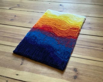 Homemade colorful carpet made from New Zealand sheep's wool, unique