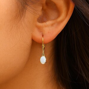 Opal Drop Earring, Natural Opal Earrings, Opal Dangle Earrings, Fire Opal Earrings, Opal Gemstone Jewelry, Handmade Opal Earrings, October Birthstone Earrings, Opal Silver Earrings, Opal Gold Earrings, Rainbow Opal Earrings, Opal Teardrop Earrings, Opal Statement Earrings, Dainty Opal Earrings, Boho Opal Earrings, Opal Crystal Jewelry, Elegant Drop Earrings, Healing Stone Earrings, Opal Jewelry for Women, Opal Bridal Earrings, Iridescent Gemstone Earrings