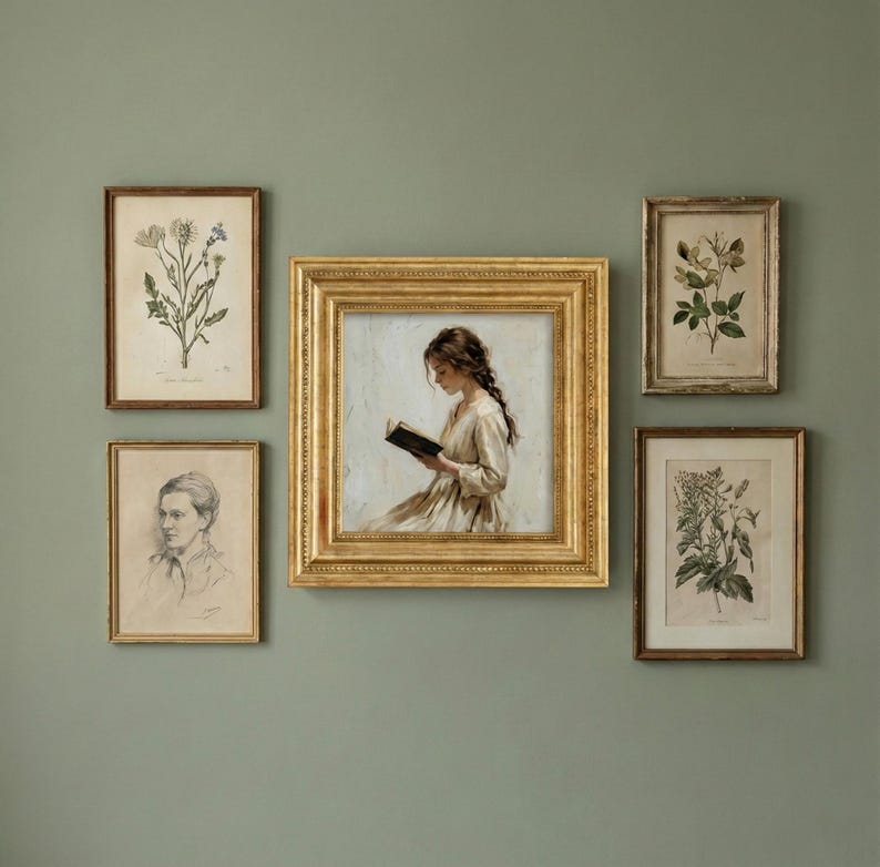 May include: A collection of framed art pieces, including botanical prints and a portrait of a person reading. The central piece is a painting in a gold frame. The other frames are various sizes and styles, creating a gallery wall aesthetic.
