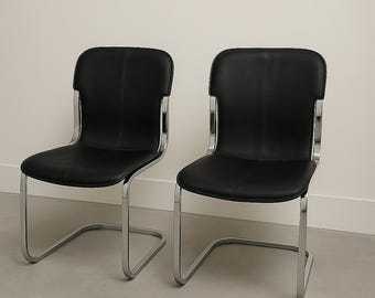 1/6 Sillas de comedor Willy Rizzo Cidue en cuero negro y cromo