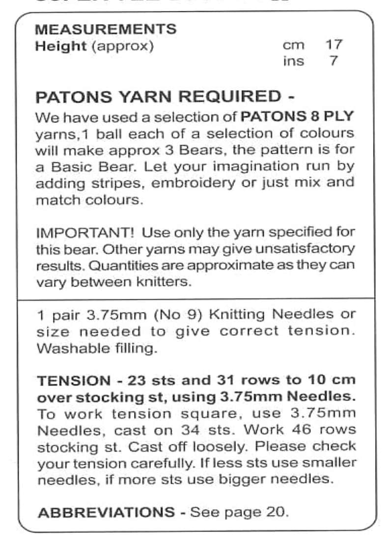 May include: A black and white knitting pattern sheet with measurements in centimeters and inches. The text details yarn requirements, needle sizes, and tension instructions for a Basic Bear knitting project. The height is approximately 7 inches.
