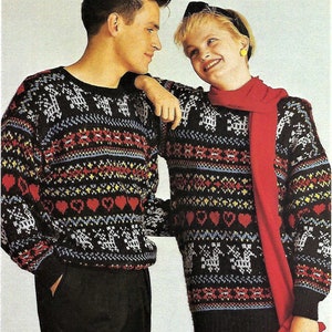 May include: Two people wearing matching black, white, red, and blue patterned sweaters with a reindeer design. The woman is wearing a red scarf and a red skirt.