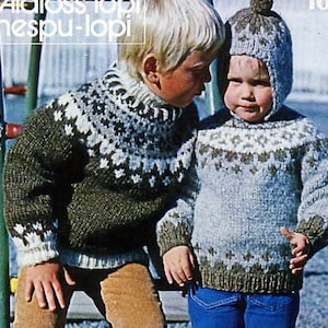 May include: Two children wearing traditional Icelandic sweaters, known as lopapeysa, with a white and brown pattern. The boy on the left is wearing a green sweater and the boy on the right is wearing a blue sweater. Both sweaters have a high neck and are made of wool.
