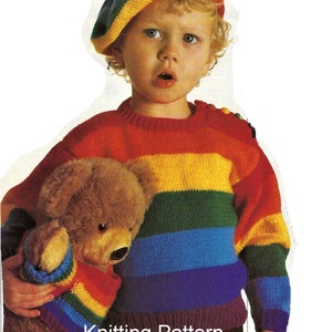 May include: Knitting pattern for a rainbow striped sweater and matching beret with a pom pom. The pattern includes instructions for both the sweater and the hat.