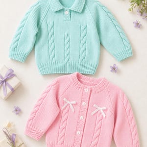May include: A light mint green long-sleeve knit sweater with a collar and a single button, paired with a light pink long-sleeve knit cardigan featuring a button-down front, two small white ribbon bows, and cable knit detailing on both garments.