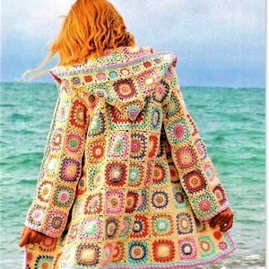 May include: A colorful crocheted hooded cardigan with a patchwork design in shades of pink, yellow, blue, and green. The cardigan is made of granny squares and has a long, flowing silhouette.