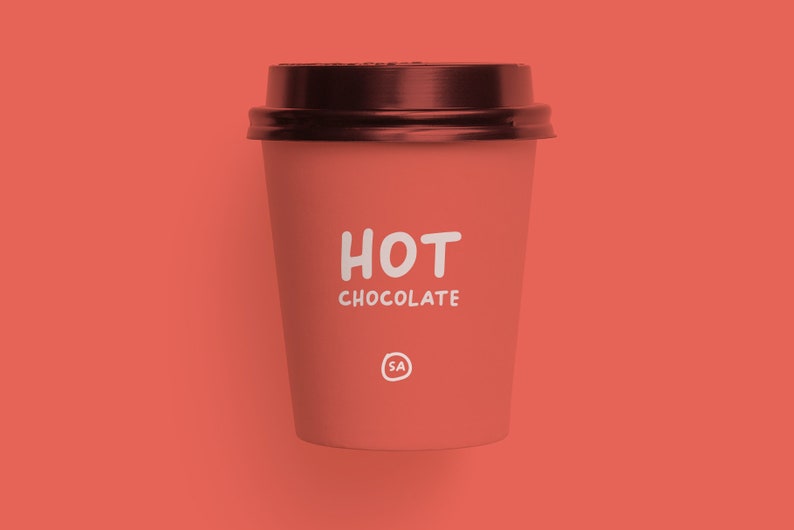 May include: A red to-go cup with a brown lid. The cup has white text that says "HOT CHOCOLATE" and a small white circle with the letters "SA" inside.