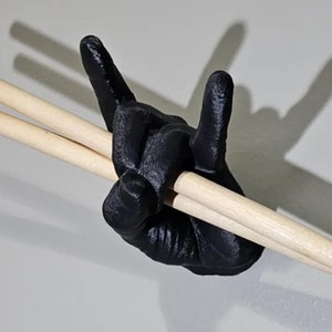 Suporte de parede Rock Hands para baquetas, com gancho para baquetas, estilo rock and roll, perfeito para bateristas, ideal para decoração de parede de bandas e estúdios de gravação.