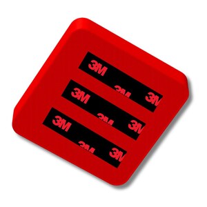 May include: A red square with three black stripes and the word "3M" printed in red on each stripe.