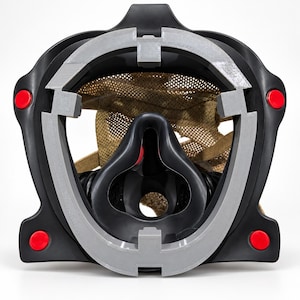 May include: A black protective face mask featuring a grey circular frame, four bright red circular buttons at the corners, and an internal tan mesh fabric harness. The central black nose and mouth piece is contoured with a hollow opening.