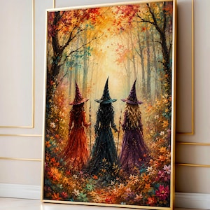 May include: A framed wall art print depicting three figures wearing pointed hats and long dresses in red, dark blue, and purple. They stand in a forest filled with autumn leaves, vibrant orange and yellow foliage, and scattered colorful flowers.