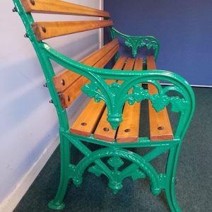 Antique cast iron and mahogany garden bench