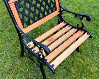 Antique Victorian cast iron framed garden chairs x 4. Chairs have lattice panelled backs and hardwood slats.