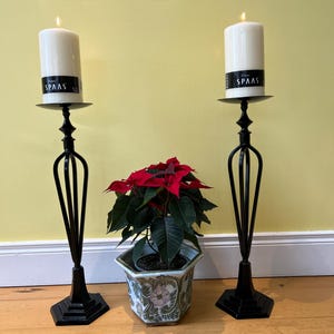 Pair of large antique cast iron candle sticks/candle stands/candle holders