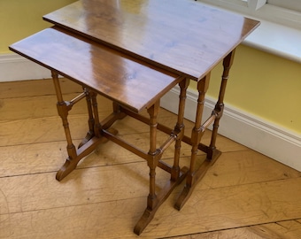 Pair of walnut occasional nest tables