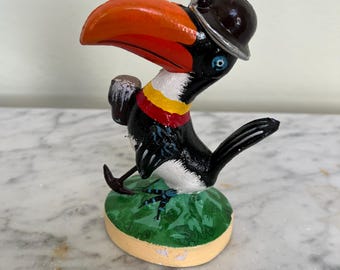 Vintage cast iron statue of the John Gilroy inspired Guinness Toucan