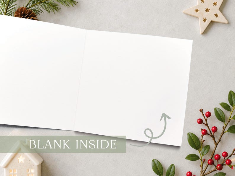 May include: A square greeting card opened to reveal a completely blank white interior. A light gray hand-drawn arrow points toward the center of the empty page. The text BLANK INSIDE is printed in white over a muted green rectangular overlay.