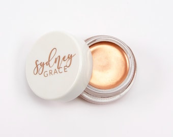 Rozświetlacz w kremie Bronze Soaking It In