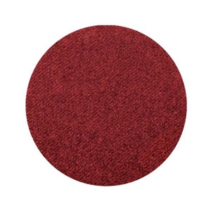 May include: A close-up of a round, red, textured surface. The surface is smooth and has a slight sheen.