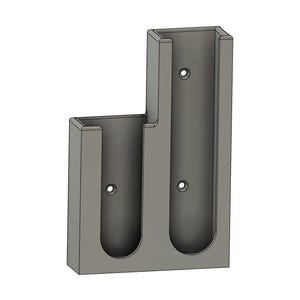 May include: A gray wall mount with two vertical slots for holding items. The slots are about 10 inches tall and 2 inches wide.