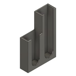 May include: A gray plastic organizer with two vertical slots for holding items. The organizer has a rectangular base and a vertical wall on one side.