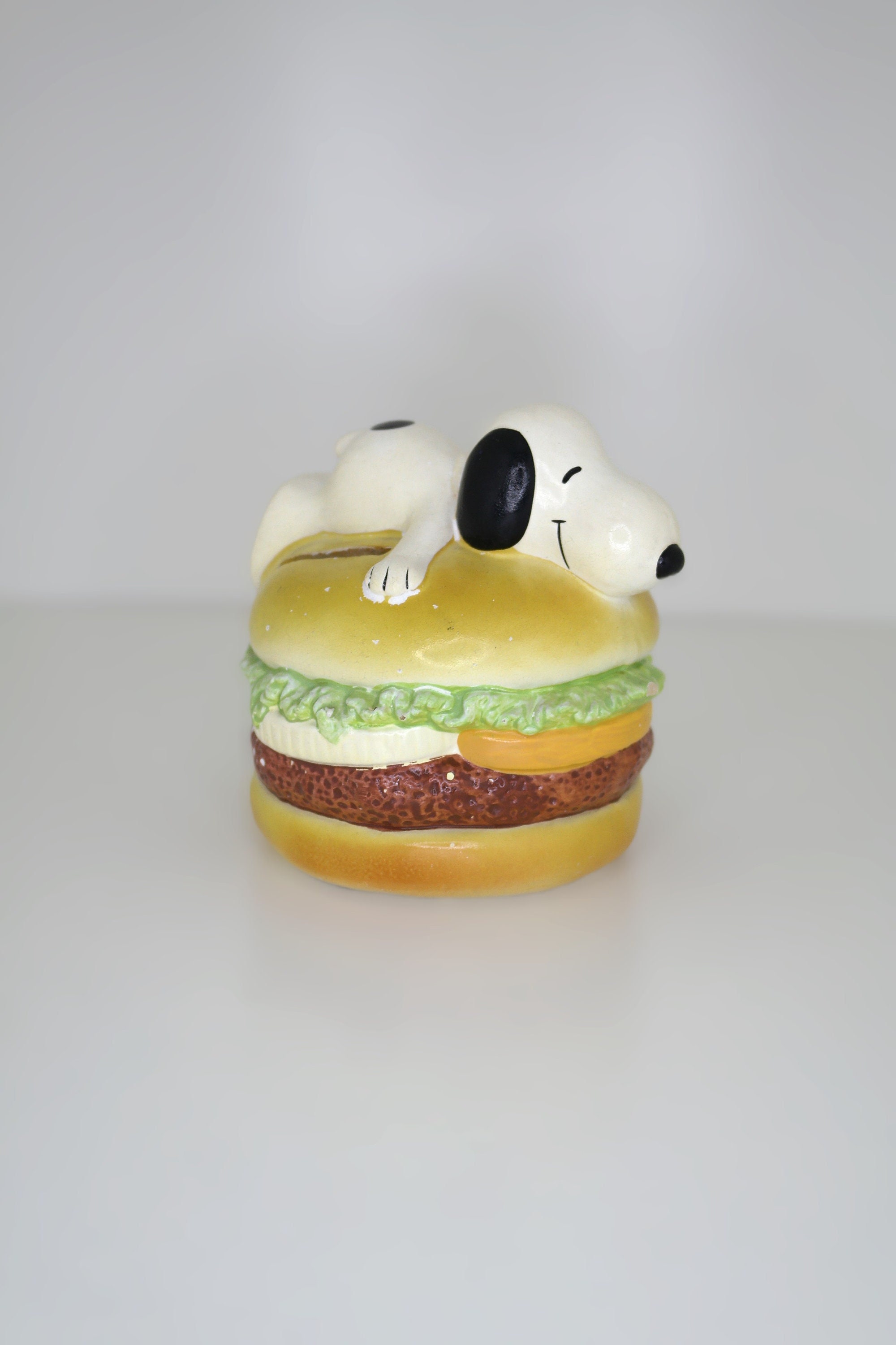 Vintage Snoopy on a Hamburger Ceramic Coin Bank - With Stopper