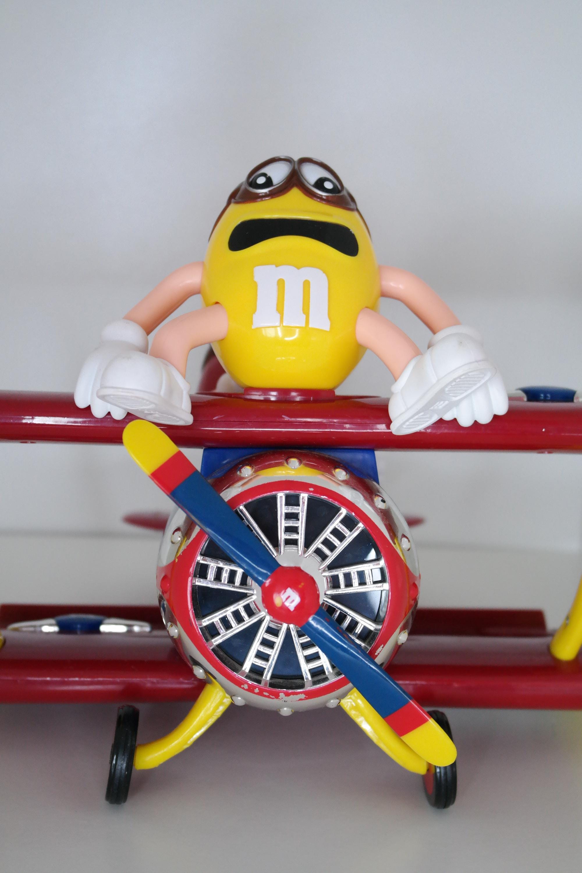 Vintage M&M Dispenser - Barnstorming Plane With Two Bean Pilots