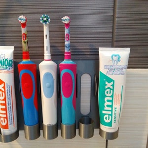 Familie Wandhalterung Halter elektrische Zahnbürste Oral-B und Zahnpasta