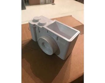 Camera business card holder
