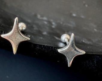 S999 Pure Silver Starburst Stud Earrings – 10×7mm