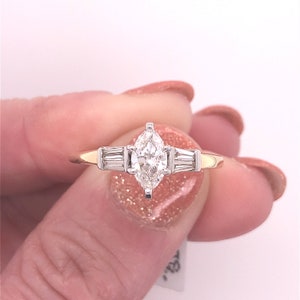 Vintage 14 Karat Yellow Gold Engagement Ring With 4=0.20 CTTW Baguette Diamonds And One 0.54 CT Marquise G SI3 Diamond